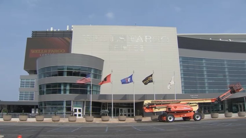 Orange lift outside of the Wells Fargo Center with the sign removed